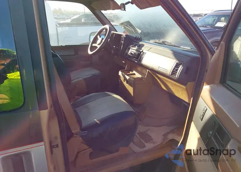 1990 GMC Safari z USA, uszkodzony, nr VIN 1GKDM15Z3LB540913